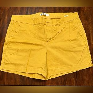 Yellow/gold khaki shorts. Size 18